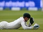 Australia's wicket keeper Alex Carey reacts after failing to take a catch Australia's wicket keeper Alex Carey reacts after failing to take a catch