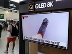 A TV screen shows an image of North Korea's missile launch during a news program, at the Seoul Railway Station in Seoul, South Korea. A TV screen shows an image of North Korea's missile launch during a news program, at the Seoul Railway Station in Seoul, South Korea.