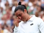 Tunisia’s Ons Jabeur with the runners up trophy reacts after losing her final match against Czech Republic's Marketa Vondrousova 