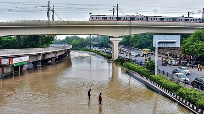 A road near ISBT after the swollen Yamuna river flooded low-lying areas across NCR. (Photo: PTI) (HT_PRINT) A road near ISBT after the swollen Yamuna river flooded low-lying areas across NCR. (Photo: PTI) (HT_PRINT)