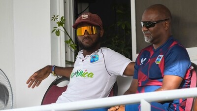 Kraigg Brathwaite (L) and coach Andre Coley (R) of West Indies (AFP) Kraigg Brathwaite (L) and coach Andre Coley (R) of West Indies (AFP)