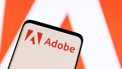 FILE PHOTO: Adobe logo is seen on smartphone in this illustration taken June 13, 2022. (REUTERS/Dado Ruvic/Illustration/File Photo)