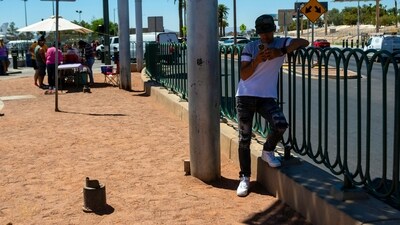 A man hides under what little shade was available in Las Vegas. Nearly a third of Americans were under extreme heat advisories, watches and warnings Friday, including in Las Vegas as a high pressure dome moves west from Texas. (AP) A man hides under what little shade was available in Las Vegas. Nearly a third of Americans were under extreme heat advisories, watches and warnings Friday, including in Las Vegas as a high pressure dome moves west from Texas. (AP)