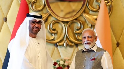 Prime Minister Narendra Modi and president-designate of the 28th session of the UN Climate Change (COP28 in UAE) Sultan Al Jaber during a meeting, in Abu Dhabi, Saturday. (PTI)