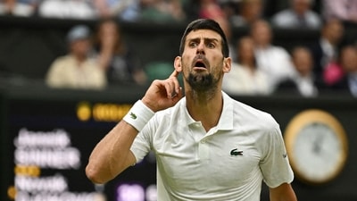 Serbia's Novak Djokovic reacts during his semi final match against Italy's Jannik Sinner (REUTERS)