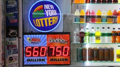A Powerball and Mega Millions lottery advertisement is displayed at a newsstand on July 12, 2023 in New York City. (Getty Images via AFP)
