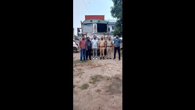 With the arrest of the accused, the police have also recovered two trucks and a .32 bore pistol (HT Photo) With the arrest of the accused, the police have also recovered two trucks and a .32 bore pistol (HT Photo)
