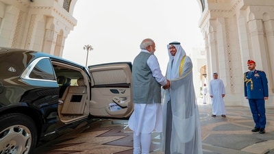 Prime Minister Narendra Modi being welcomed by UAE President Sheikh Mohamed bin Zayed Al Nahyan at the Qasr Al Watan Presidential Palace, in Abu Dhabi, Saturday, (PTI) Prime Minister Narendra Modi being welcomed by UAE President Sheikh Mohamed bin Zayed Al Nahyan at the Qasr Al Watan Presidential Palace, in Abu Dhabi, Saturday, (PTI)