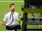 Novak Djokovic questions a 'hindrance' call from umpire Richard Haigh as he plays Italy's Jannik Sinner in Wimbledon 