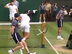 Novak Djokovic smashes his racquet against the post during Wimbledon 2023 final Novak Djokovic smashes his racquet against the post during Wimbledon 2023 final