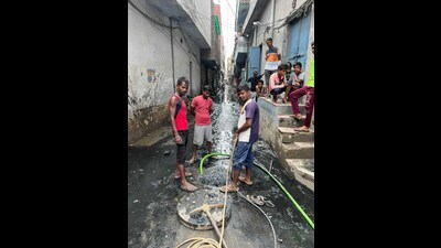 A street filled with sewage in Ludhiana on Saturday. (HT Photo) A street filled with sewage in Ludhiana on Saturday. (HT Photo)