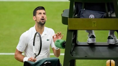 Novak Djokovic questions a 'hindrance' call from umpire Richard Haigh as he plays Italy's Jannik Sinner in Wimbledon (AP) Novak Djokovic questions a 'hindrance' call from umpire Richard Haigh as he plays Italy's Jannik Sinner in Wimbledon (AP)