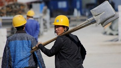 Monthly data for industrial production, retail sales and fixed investment — all scheduled for Monday — are expected to show a marked slowdown in June. (REUTERS)