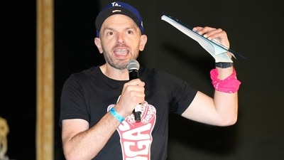 Actor Paul Scheer speaks to the crowd at a fundraiser Saturday. (AP)