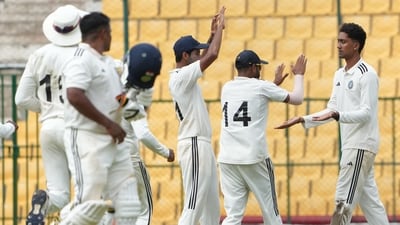 R Sai Kishore celebrates with teammates after the wicket of West Zone batter Sarfaraz Khan (PTI) R Sai Kishore celebrates with teammates after the wicket of West Zone batter Sarfaraz Khan (PTI)