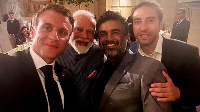 French President Emmanuel Macron clicked a selfie with PM Narendra Modi, R Madhavan and Mathieu Flamini. French President Emmanuel Macron clicked a selfie with PM Narendra Modi, R Madhavan and Mathieu Flamini.