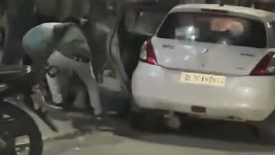 The video shows a group of men thrashing a man and dragging inside the car
