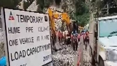 Chamoli District Magistrate, Himashu Khurana on Sunday said that vehicular movement was temporarily resumed on Joshimath-Malari Highway near Jumma village. (ANI) Chamoli District Magistrate, Himashu Khurana on Sunday said that vehicular movement was temporarily resumed on Joshimath-Malari Highway near Jumma village. (ANI)