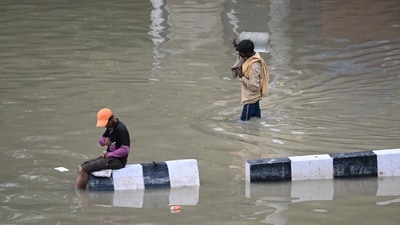 A view of Waterlogged street after the Yamuna River water flows above danger levels at Hanuman Temple, Kashmiri Gate in New Delhi, on Saturday. (Photo by Sanchit Khanna/ Hindustan Times) A view of Waterlogged street after the Yamuna River water flows above danger levels at Hanuman Temple, Kashmiri Gate in New Delhi, on Saturday. (Photo by Sanchit Khanna/ Hindustan Times)