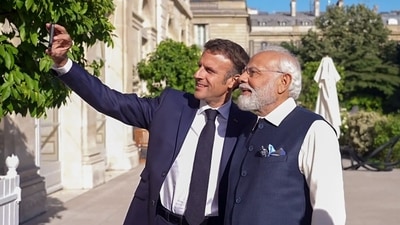 French President Emmanuel Macron and Prime Minister Narendra Modi capturing a selfie in Paris on Friday. (ANI Photo) French President Emmanuel Macron and Prime Minister Narendra Modi capturing a selfie in Paris on Friday. (ANI Photo)