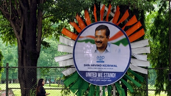 A Poster of Delhi chief minister Arvind Kejriwal has been put up on Sunday on the eve of the Opposition meeting in Bengaluru. (ANI Photo)
