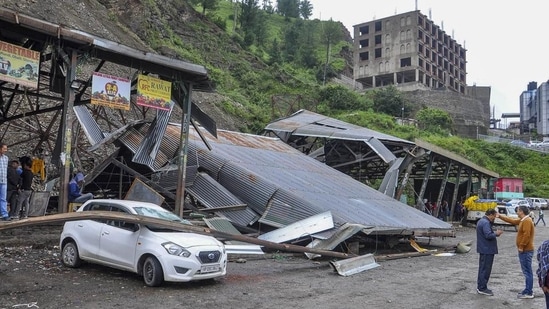 Shimla: Damaged sheds of the Bhattakufer apple market after a landslide due to heavy monsoon rainfall. (PTI) Shimla: Damaged sheds of the Bhattakufer apple market after a landslide due to heavy monsoon rainfall. (PTI)
