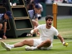 Spain's Carlos Alcaraz celebrates after beating Novak Djokovic in the Wimbledon 2023 final.