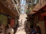 Emergency and rescue personnel search for survivors in the rubble of the building that collapsed. 
