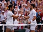Spain's Carlos Alcaraz (Left) with Serbia's Novak Djokovic after winning the Wimbledon final.