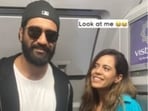 Vicky Kaushal with a fan inside their flight. Vicky Kaushal with a fan inside their flight.