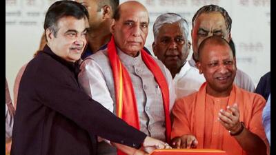 •Defence minister Rajnath Singh with Union minister of road transport and highways Nitin Gadkari and UP chief minister Yogi Adityanath inaugurated and laid the foundation stone of various development works, in Lucknow on Monday. (ANI Photo) •Defence minister Rajnath Singh with Union minister of road transport and highways Nitin Gadkari and UP chief minister Yogi Adityanath inaugurated and laid the foundation stone of various development works, in Lucknow on Monday. (ANI Photo)