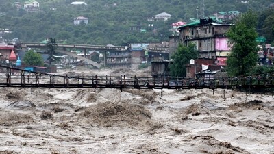 The overflowing river Beas following heavy rains in Kullu district in the northern state of Himachal Pradesh, India. Himachal tourism suffers another jolt after Covid-19 amid heavy rain and flood (REUTERS)