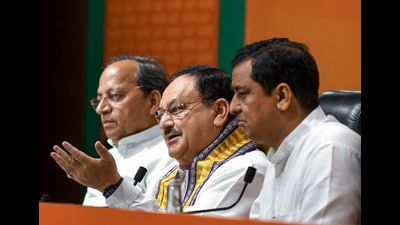 BJP National President JP Nadda along with party MPs Arun Singh and Anil Baluni addresses a press conference, at Party HQ in New Delhi on Monday. (ANI)