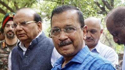 Delhi LG VK Saxena and CM Arvind Kejriwal during the inspection of the damaged drain regulator at Vikas Marg, ITO, in New Delhi on Friday. (PTI) Delhi LG VK Saxena and CM Arvind Kejriwal during the inspection of the damaged drain regulator at Vikas Marg, ITO, in New Delhi on Friday. (PTI)