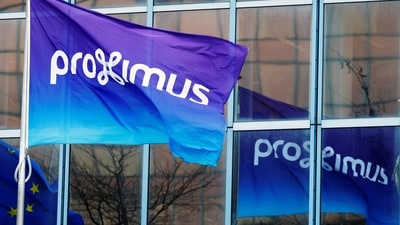 A flag with the logo of Proximus is seen at the headquarters of the Belgian telecoms operator in Brussels, (REUTERS)