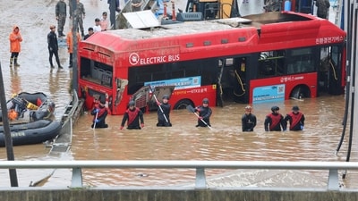 The death toll from days of torrential rain in South Korea rose to 40, including a dozen people found dead in a submerged underpass. (AFP) The death toll from days of torrential rain in South Korea rose to 40, including a dozen people found dead in a submerged underpass. (AFP)