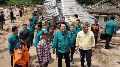 South Korean President Yoon Suk Yeol headed down to the storm-battered towns of South Korea and blamed authorities' failure to follow disaster response rules. Yoon vowed on July 17, to "completely overhaul" the country's approach to extreme weather from climate change, after at least 40 people were killed by recent flooding and landslides during monsoon rains. (AFP) South Korean President Yoon Suk Yeol headed down to the storm-battered towns of South Korea and blamed authorities' failure to follow disaster response rules. Yoon vowed on July 17, to "completely overhaul" the country's approach to extreme weather from climate change, after at least 40 people were killed by recent flooding and landslides during monsoon rains. (AFP)