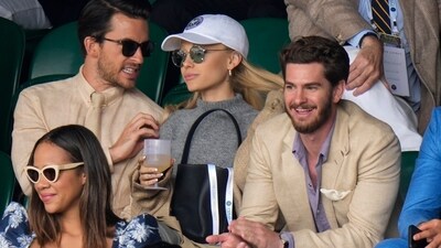 Andrew Garfield spotted enjoying the match from the stands. Singer Ariana Grande was busy chatting with actor Jonathan Bailey as they all watched Carlos Alcaraz beat Novak Djokovic in the final of the Wimbledon tennis championship on Sunday. &nbsp; (AP)