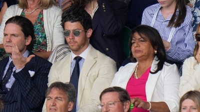 Nick Jonas had watched the Wimbledon women's final with wife Priyanka Chopra on Saturday. On Sunday, he was accompanied by her mom Dr Madhu Chopra. They were sitting in the same section as Tom Hiddleston, Andrew Garfield and Ariana Grande. (AP) Nick Jonas had watched the Wimbledon women's final with wife Priyanka Chopra on Saturday. On Sunday, he was accompanied by her mom Dr Madhu Chopra. They were sitting in the same section as Tom Hiddleston, Andrew Garfield and Ariana Grande. (AP)