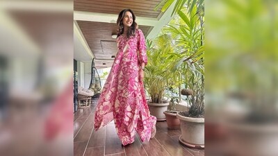 The kaftan is embellished with laser-cut finishings and shells. Rakul Preet paired it with flared matching pants. (Instagram/@rakulpreet) The kaftan is embellished with laser-cut finishings and shells. Rakul Preet paired it with flared matching pants. (Instagram/@rakulpreet)
