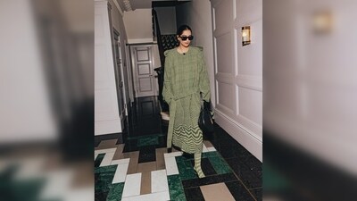 Sonam Kapoor kept her look sophisticated in every fashionable sense and paired the dress with black sunglasses, stilettos and a bag, all from Burberry. (Instagram/@theakapoor)