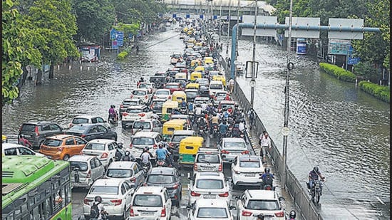 Commuters stuck in a traffic jam during peak morning hours at ITO, in New Delhi on Monday. (Vipin Kumar/HT)