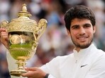 Spain's Carlos Alcaraz celebrates with the Wimbledon trophy Spain's Carlos Alcaraz celebrates with the Wimbledon trophy