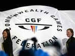 FILE - The Commonwealth Games Federation flag is carried into the arena FILE - The Commonwealth Games Federation flag is carried into the arena
