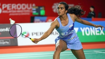 India's Pusarla V. Sindhu returns a shot during her women's singles match (AP) India's Pusarla V. Sindhu returns a shot during her women's singles match (AP)