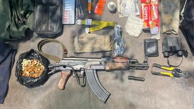 An AK 74 rifle, ammunition recovered from the site at the Krishna Ghati (KG) Sector in Poonch district. (HT Photo) An AK 74 rifle, ammunition recovered from the site at the Krishna Ghati (KG) Sector in Poonch district. (HT Photo)