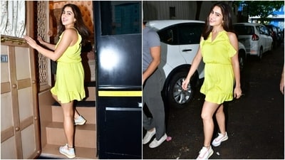 The paparazzi clicked Sara Ali Khan in Mumbai today and shared the pictures on social media. Sara chose a yellow-coloured sleeveless mini dress for the occasion. It features noodle straps, an open V neckline, frill details on the shoulders, cinched waistline, a ruffled hem, and a flowy silhouette.&nbsp; (HT PHOTO/Varinder Chawla)