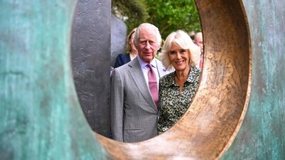 Britain's King Charles III (C) and Britain's Queen Camilla (R) in Cornwall, south-west England. (AFP) Britain's King Charles III (C) and Britain's Queen Camilla (R) in Cornwall, south-west England. (AFP)