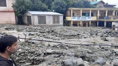 The cloudburst on Monday left a trail of destruction at Neoli village in Kullu district of Himachal Pradesh. Nine vehicles were swept away in the deluge that claimed a life at Kayas village in the district. (HT Photo) The cloudburst on Monday left a trail of destruction at Neoli village in Kullu district of Himachal Pradesh. Nine vehicles were swept away in the deluge that claimed a life at Kayas village in the district. (HT Photo)