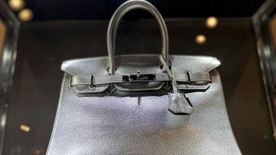 View of a Hermes Silver Metallic Chevre Birkin 30 bag up for auction at Sotheby's in New York City, US. The Taste With Vir: Meeting Dumas in Kolkata, Jane Birkin's bohemian legacy of Hermes Birkin handbag and dirty secrets (REUTERS/Roselle Chen)